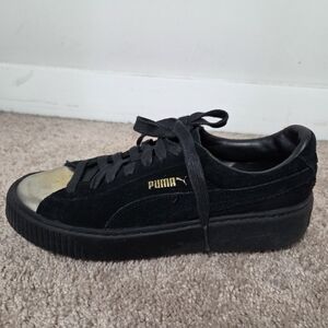 Puma Black Sneakers with Gold Accent